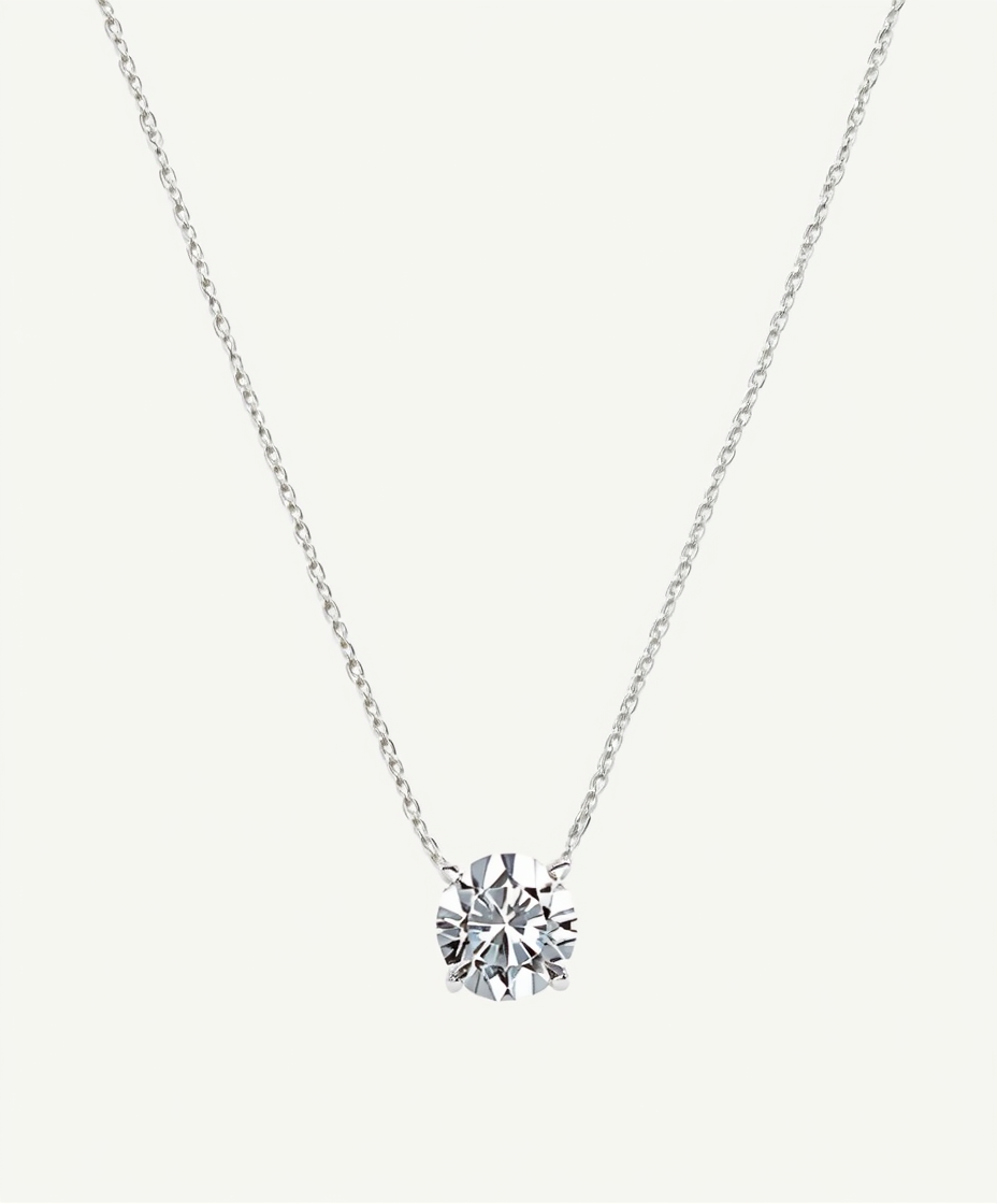 Solitaire cubic zirconia necklace in gold with a single brilliant round stone on a fine delicate chain, timeless minimalist jewelry

Title: