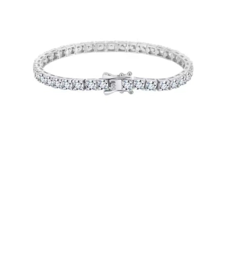 Silver bracelet with clear stones on a white background