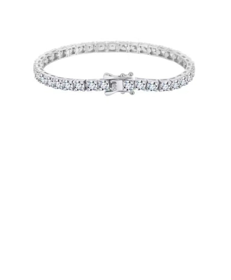 Silver bracelet with clear stones on a white background