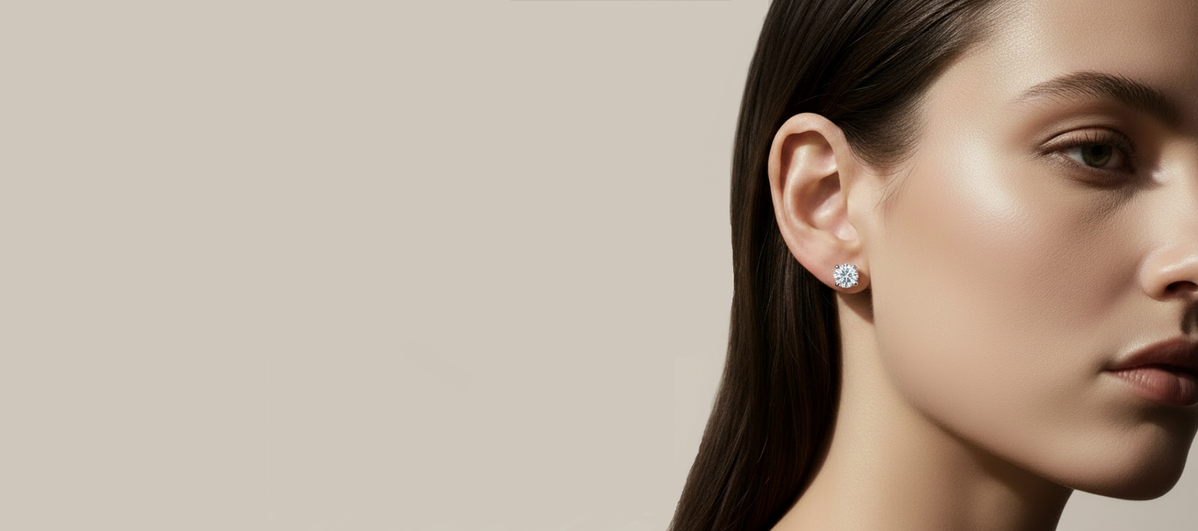 Model wearing 2 carat diamond-look stud earrings in a classic four-prong setting